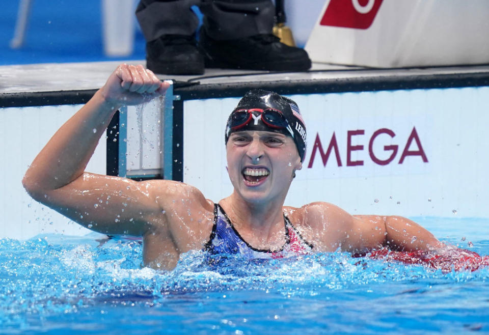 Katie Ledecky celebrates winning the Women's 1500m freestyle