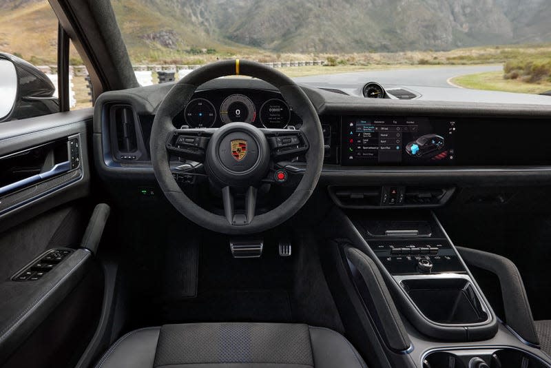 The interior of the 2024 Porsche Cayenne as seen from the driver's seat.