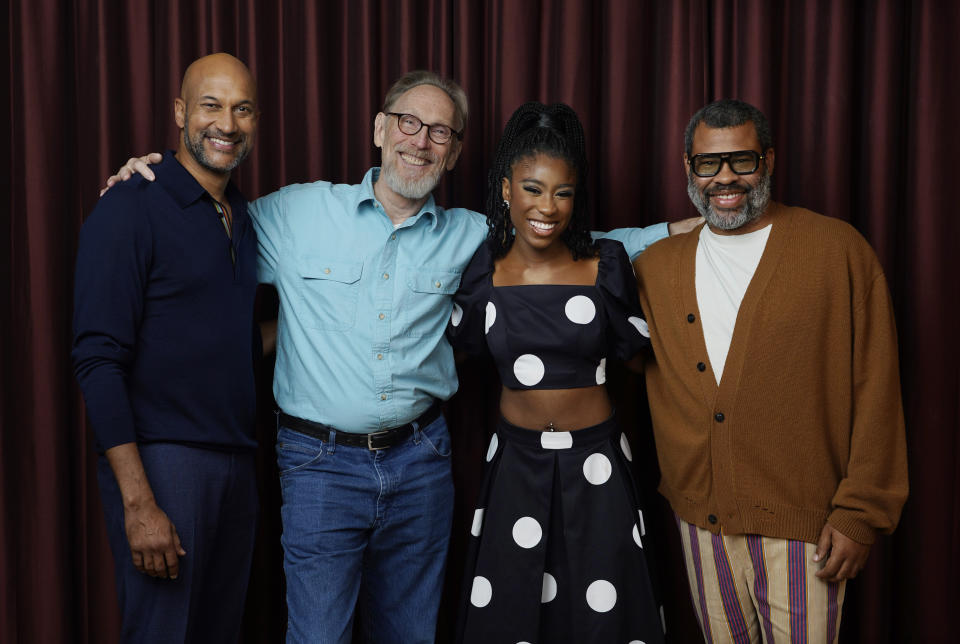 Henry Selick, second from left, co-writer and director of the stop-motion animated film "Wendell & Wild," poses for a portrait with voice cast members Keegan-Michael Key, left, and Lyric Ross, second from right, and co-writer/co-producer/cast member Jordan Peele during the 2022 Toronto International Film Festival, Sunday, Sept. 11, 2022, at the Shangri-La Hotel in Toronto. (AP Photo/Chris Pizzello)