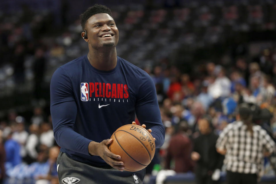 FILE - In this March 4, 2020, file photo, New Orleans Pelicans forward Zion Williamson shoots free throws prior to an NBA basketball game against the Dallas Mavericks in Dallas. The NBA said Saturday, July 25, 2020, that Williamson will have to serve a four-day quarantine for leaving the league’s Disney bubble on July 16 to tend to an urgent family matter. (AP Photo/Michael Ainsworth, File)