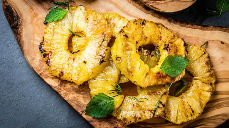 broiled pineapple on cutting board