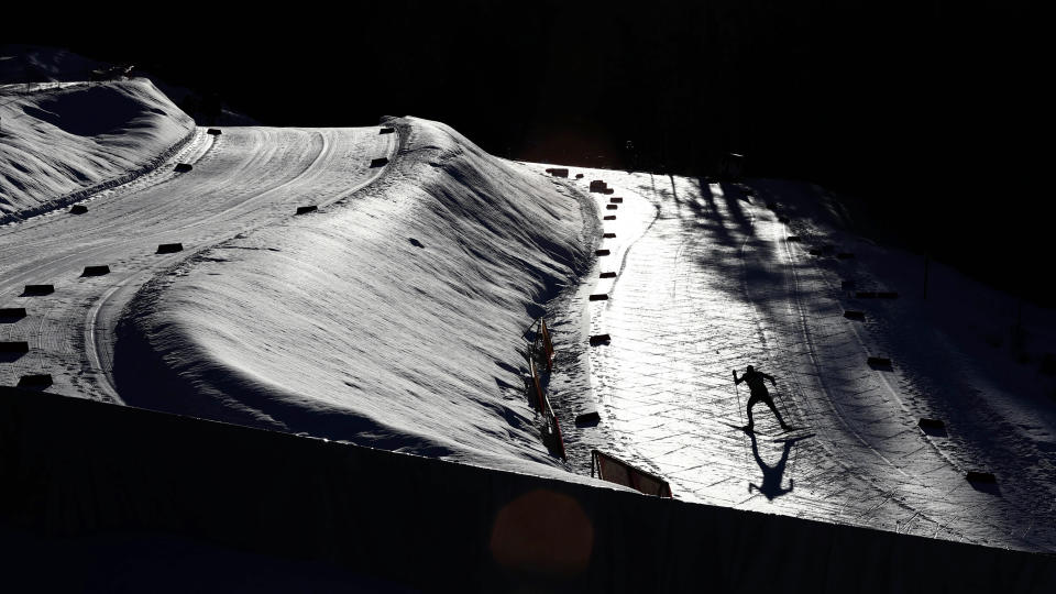 An athlete warms up for the Nordic Combined World Cup Men's Individual Gundersen NH/5km competition in Seefeld, Austria, on Jan. 31, 2020. (AP Photo/Matthias Schrader)