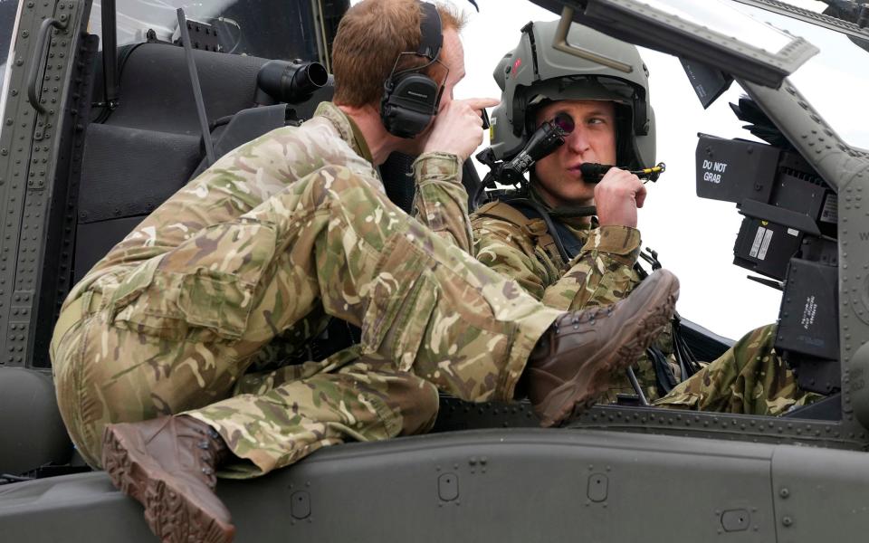 Prince William was given a tour of an Apache's cockpit