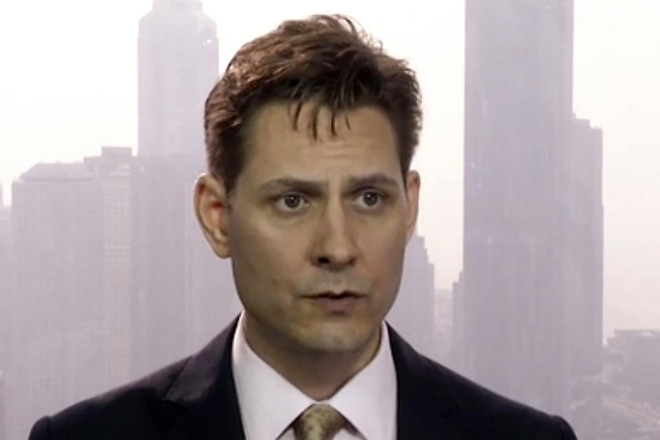 FILE - In this file image made from a March 28, 2018, video, Michael Kovrig, an adviser with the International Crisis Group, a Brussels-based non-governmental organization, speaks during an interview in Hong Kong. More than 100 academics and former diplomats are calling on China to release two Canadians, Kovrig and Michael Spavor, an entrepreneur, who have been detained in apparent retaliation for the arrest of a top Chinese tech executive in Canada. (AP Photo, File)