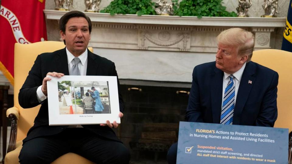 Florida’s Gov. DeSantis sits with President Trump at the White House before later reopening most of the state after weeks of coronavirus lockdown.