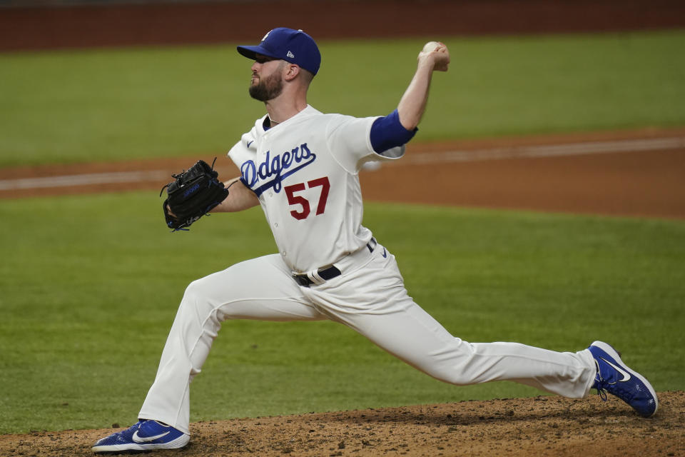 Los Angeles Dodgers pitcher Alex Wood throws against the Tampa Bay Rays during the seventh inning in Game 2 of the baseball World Series Wednesday, Oct. 21, 2020, in Arlington, Texas. (AP Photo/Eric Gay)