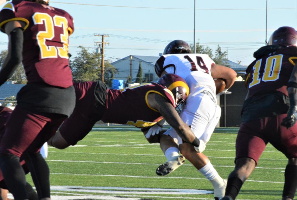 Victor Valley College's Lealofi Chanwong tackles Antelope Valley College's Bross Lee in the first quarter at Ray Moore Stadium on Saturday, Sept. 17, 2022.