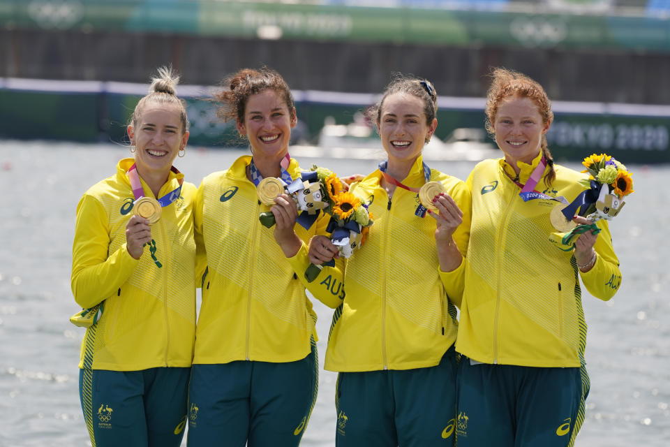 Lucy Stephan, Rosemary Popa, Jessica Morrison and Annabelle McIntyre, of Australia, pose with the gold medal following the women's rowing four final at the 2020 Summer Olympics, Wednesday, July 28, 2021, in Tokyo, Japan. (AP Photo/Darron Cummings)