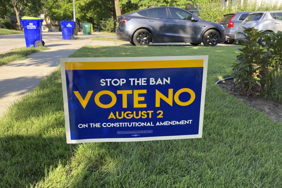 In this photo from Thursday, July 14, 2022, a sign in a yard in Merriam, Kansas, urges voters to oppose a proposed amendment to the Kansas Constitution to allow legislators to further restrict or ban abortion. Opponents of the measure believe it will lead to a ban on abortion in Kansas. / Credit: John Hanna / AP