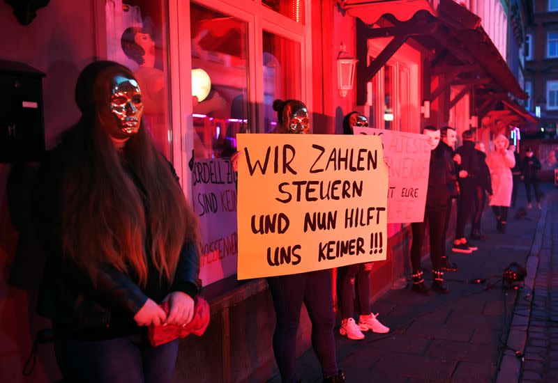 Prostitutes hold a rally in Hamburg demanding the reopening of Germany's brothels