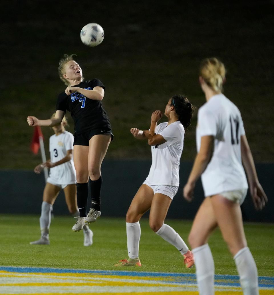 Bartram Trail's Carolyn Johnson (7) goes up for the header against Boca Raton. The junior scored in the regional championship and the state semifinal to help the Bears to their third FHSAA title in four years.