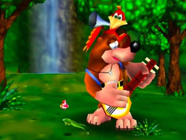 Opening image from Banjo-Kazooie, featuring Banjo the bear playing his banjo in front of a waterfall while Kazooie perches on his shoulders