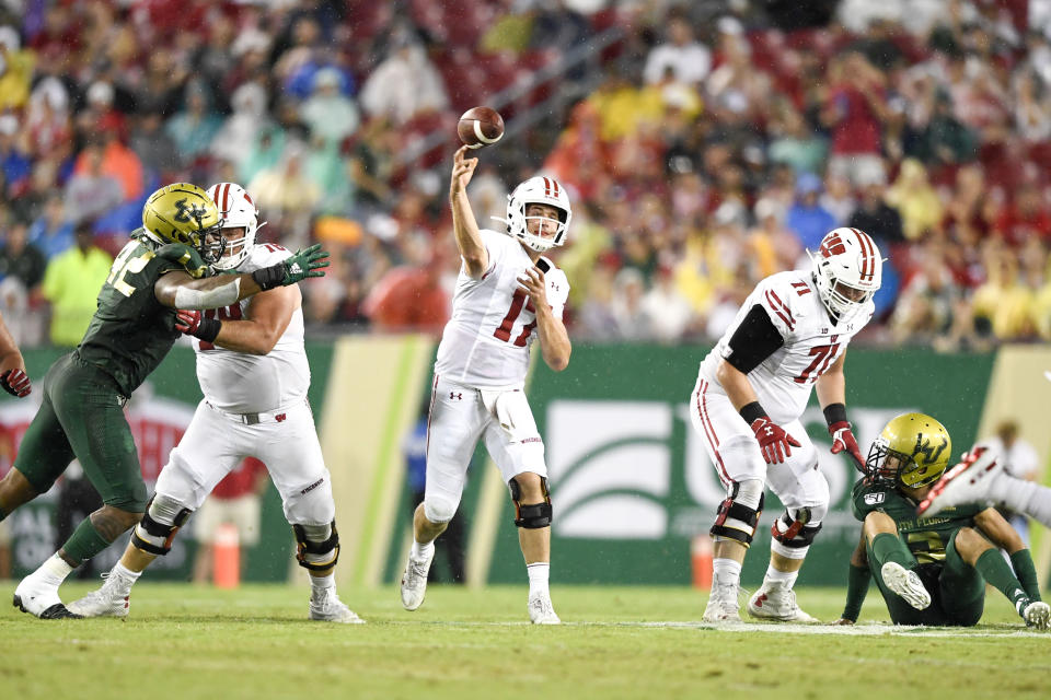 Aug. 30, 2019; Tampa, Florida; Wisconsin Badgers quarterback Jack Coan (17) looks to pass the ball during the first half against the South Florida Bulls at Raymond James Stadium. Douglas DeFelice-USA TODAY Sports