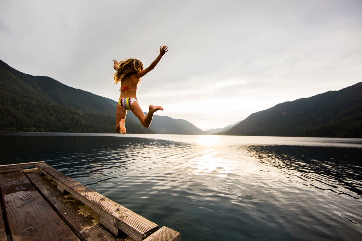 Dive in: wild swimming can boost your circulation and relieve stress. (Getty Images)