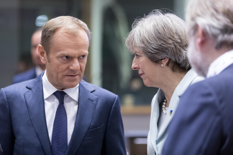 EU Council president Donald Tusk and prime minister Theresa May in conversation at a previous summit (Getty)