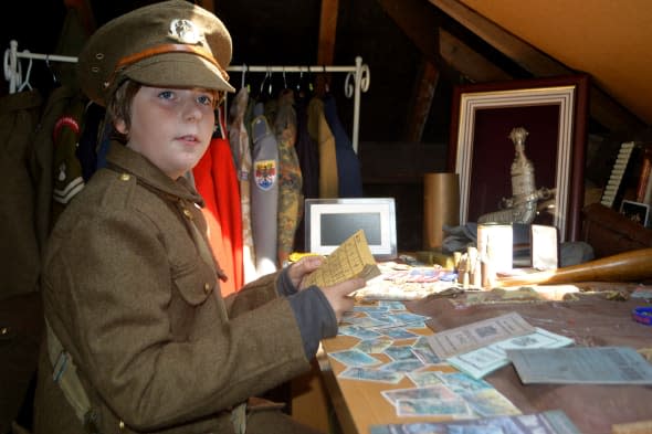 Boys create WW1 trench in garden