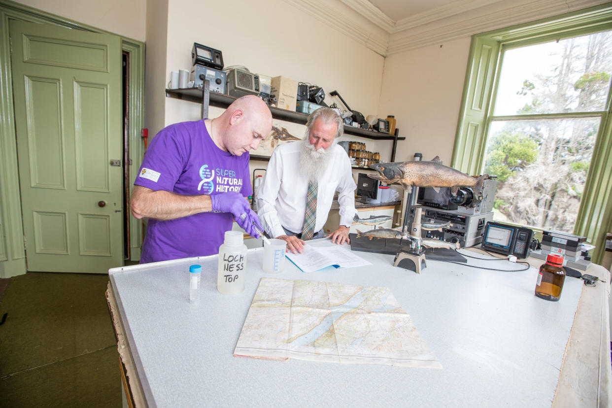 Mr Gemmell, left, and researcher Dr Adrian Shine of the Loch Ness Centre examine the samples (Picture: SWNS)