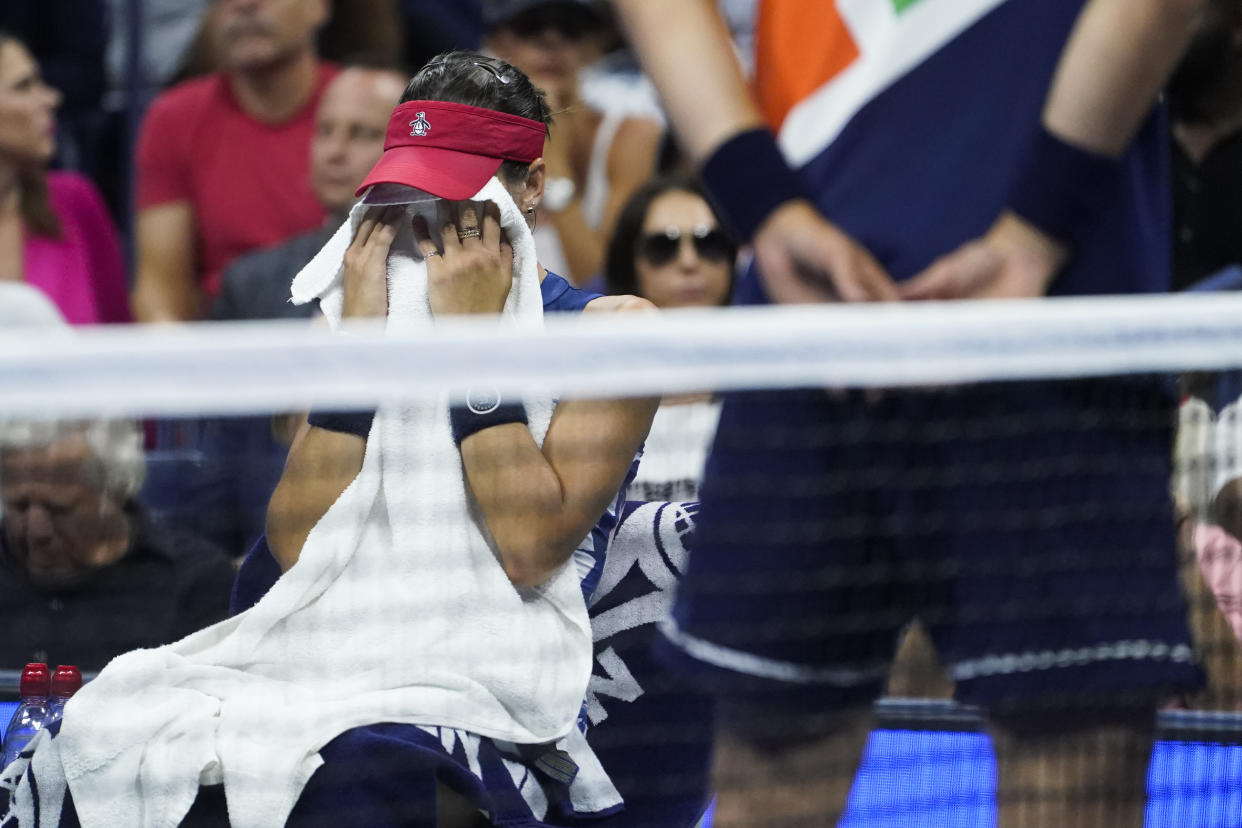 Ajla Tomljanovic, of Australia, wipes her face during a match against to Serena Williams, of the United States, during the third round of the U.S. Open tennis championships, Friday, Sept. 2, 2022, in New York. (AP Photo/John Minchillo)