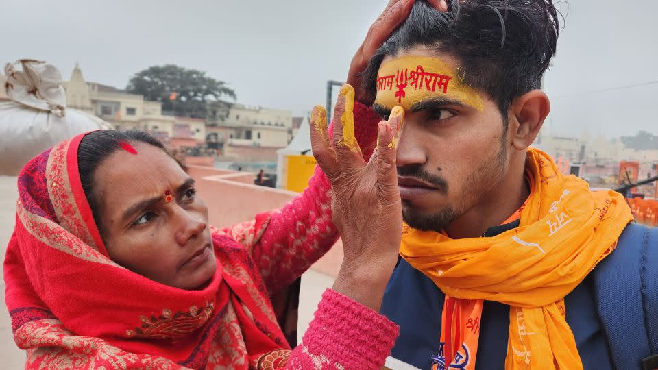 A Hindu devotee seen with his face painted in Ayodhya, India, on January 22. - Vedika Sud/CNN