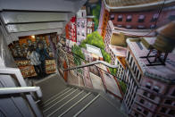 This photo provided by citizenM Hotel shows a stairwell enhanced with graffiti art in their Bowery property in New York. The hotel commissioned the graffiti artists who formerly worked in Queens' 5 Pointz studios, before a catastrophic fire. Their custom works not only enliven the stairwells, but have created a new Museum of Street Art for guests and neighbors to enjoy. (Christian Johnson/citizenM via AP)