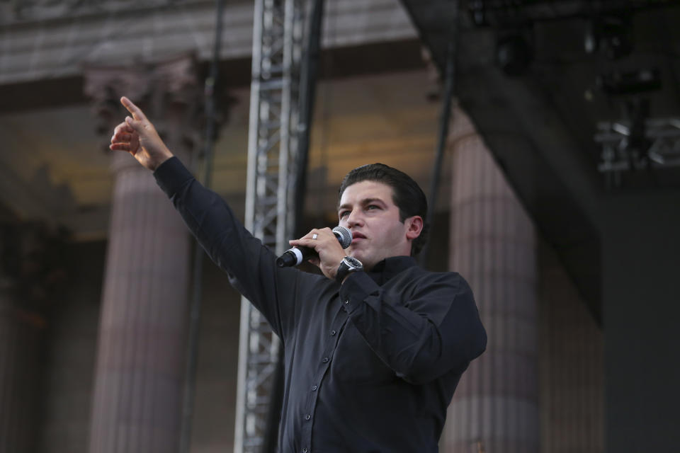 Samuel Garcia, the newly-elected governor of Nuevo Leon attends his victory celebration in Nuevo Leon, at the Macroplaza of Monterrey, in Nuevo Leon state, Mexico, Monday, June 7, 2021. Garcia, 33, is a baby-faced former senator whose blond wife, YouTuber Mariana Rodríguez, is better known for posting videos of herself giving makeup tutorials or clutching a small dog. (AP Photo/Roberto Martinez)