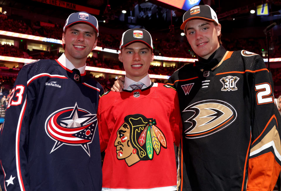 NASHVILLE, TENNESSEE - JUNE 28: (LR) Adam Fantilli, third overall pick by the Columbus Blue Jackets, Connor Bedard, first overall pick by the Chicago Blackhawks, and Leo Carlsson, second overall pick by the Anaheim Ducks, pose for a photo during the 2023 Upper Deck NHL Draft - Round One at Bridgestone Arena on June 28, 2023 in Nashville, Tennessee.  (Photo by Dave Sandford/NHLI via Getty Images)