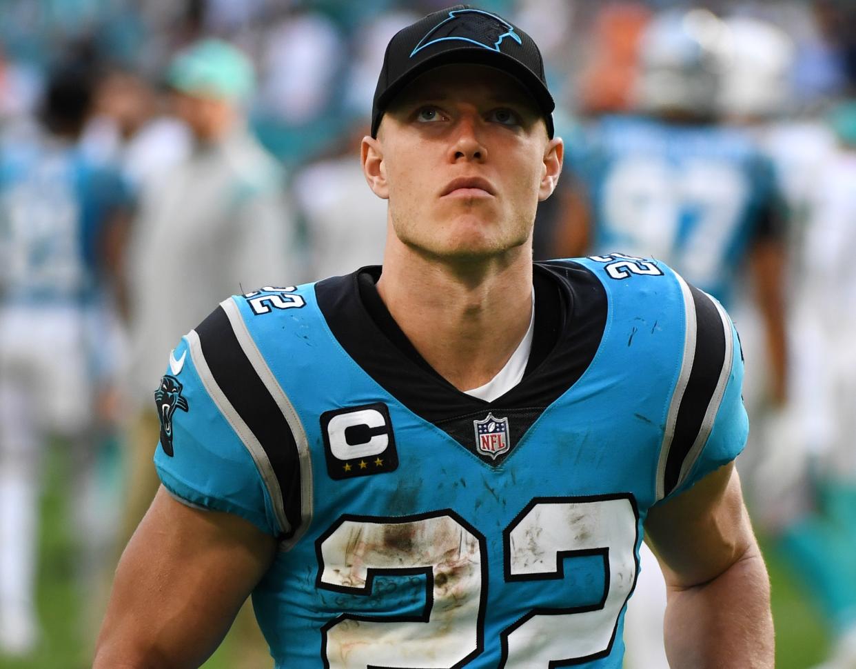 MIAMI GARDENS, FLORIDA - NOVEMBER 28: Christian McCaffrey #22 of the Carolina Panthers leaves the field after the game against the Miami Dolphins at Hard Rock Stadium on November 28, 2021 in Miami Gardens, Florida. Miami defeated Carolina 33-10 (Photo by Eric Espada/Getty Images)
