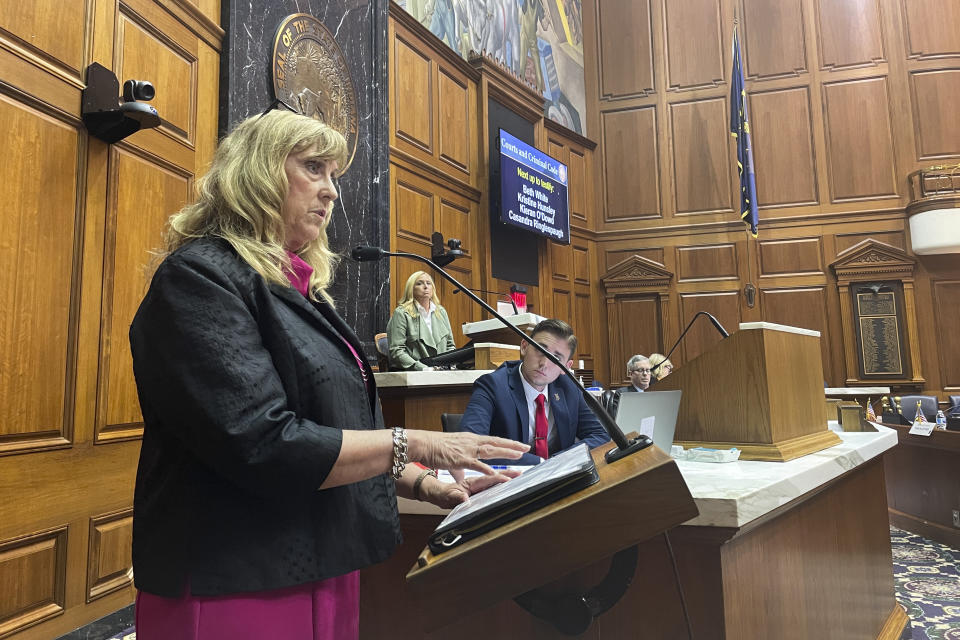 Jodi Smith speaks to an Indiana House committee on behalf of Indiana Right to Life, an anti-abortion advocacy group on Tuesday, Aug. 2, 2022, in Indianapolis. Smith said the organization supports some, but not all, of a House amendment to a Senate abortion ban approved July 30. (AP Photo/Arleigh Rodgers)