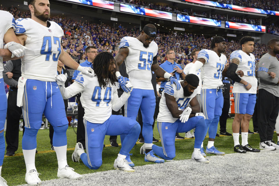 Jalen Reeves-Maybinof the Detroit Lions and teammate Steve Longa take a knee during the national anthem before the game against the Minnesota Vikings on Oct. 1 at U.S. Bank Stadium in Minneapolis, Minnesota. (Photo: Hannah Foslien via Getty Images)
