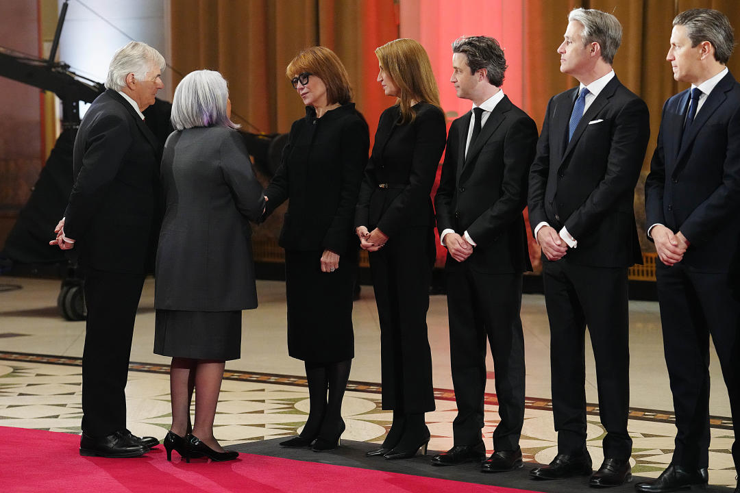 Governor General Mary Simon, and her husband Whit Fraser, left, pay their respects to Mila Mulroney and Mulroney family members as former prime minister Brian Mulroney lies in state at the Sir John A. Macdonald building opposite Parliament Hill in Ottawa on Tuesday, March 19, 2024. THE CANADIAN PRESS/Sean Kilpatrick
