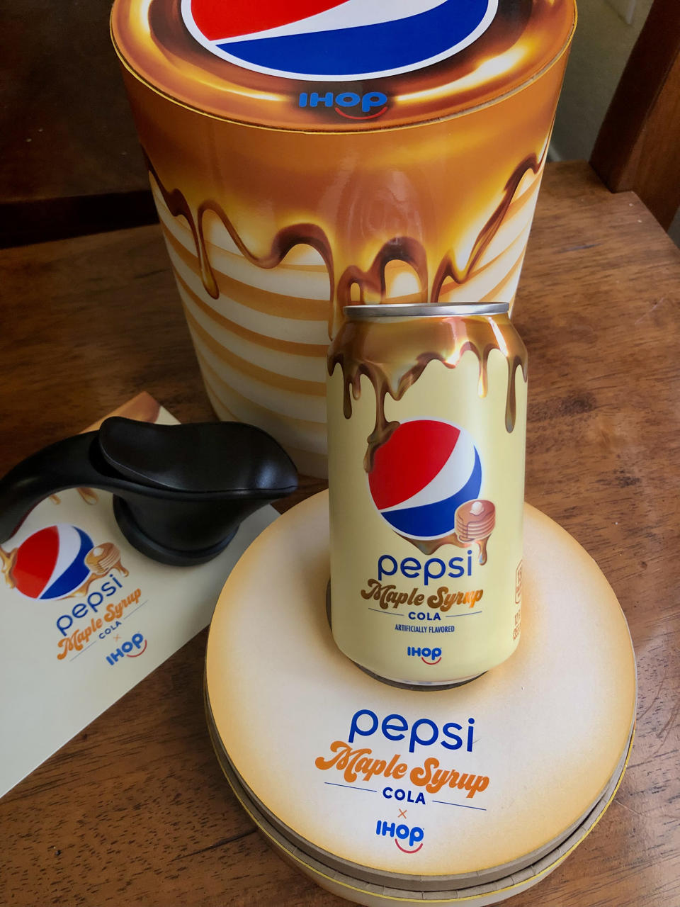 Pepsi Maple Syrup Cola arrives in a pancake-shaped display box, and comes with a pour spout. (Heather Martin)