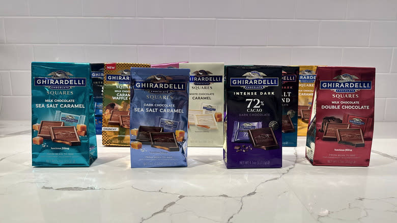 Bags of Ghirardelli chocolate squares on counter