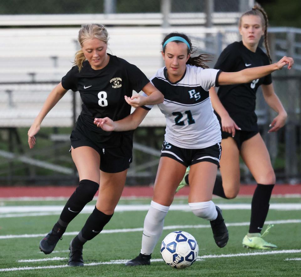 From left, Whitman-Hanson's Ella Nagle and Plymouth South's Carley Siegelman go after a loose ball during a game on Thursday, Sept. 15, 2022.  