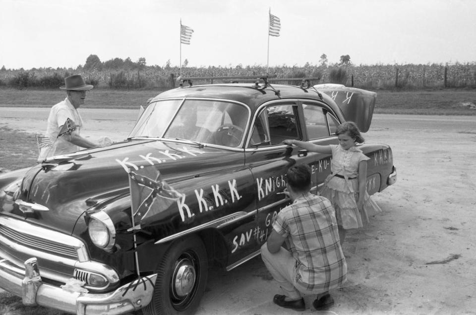 <div class="inline-image__caption"><p>Ku Klux Klan, Reidsville, Georgia, 1957 – A car being decorated for a Knights of the KKK meeting.</p></div> <div class="inline-image__credit">All photographs are copyright Fred Baldwin from the book Dear Mr. Picasso: An Illustrated Love Affair with Freedom published by Schilt Publishing</div>