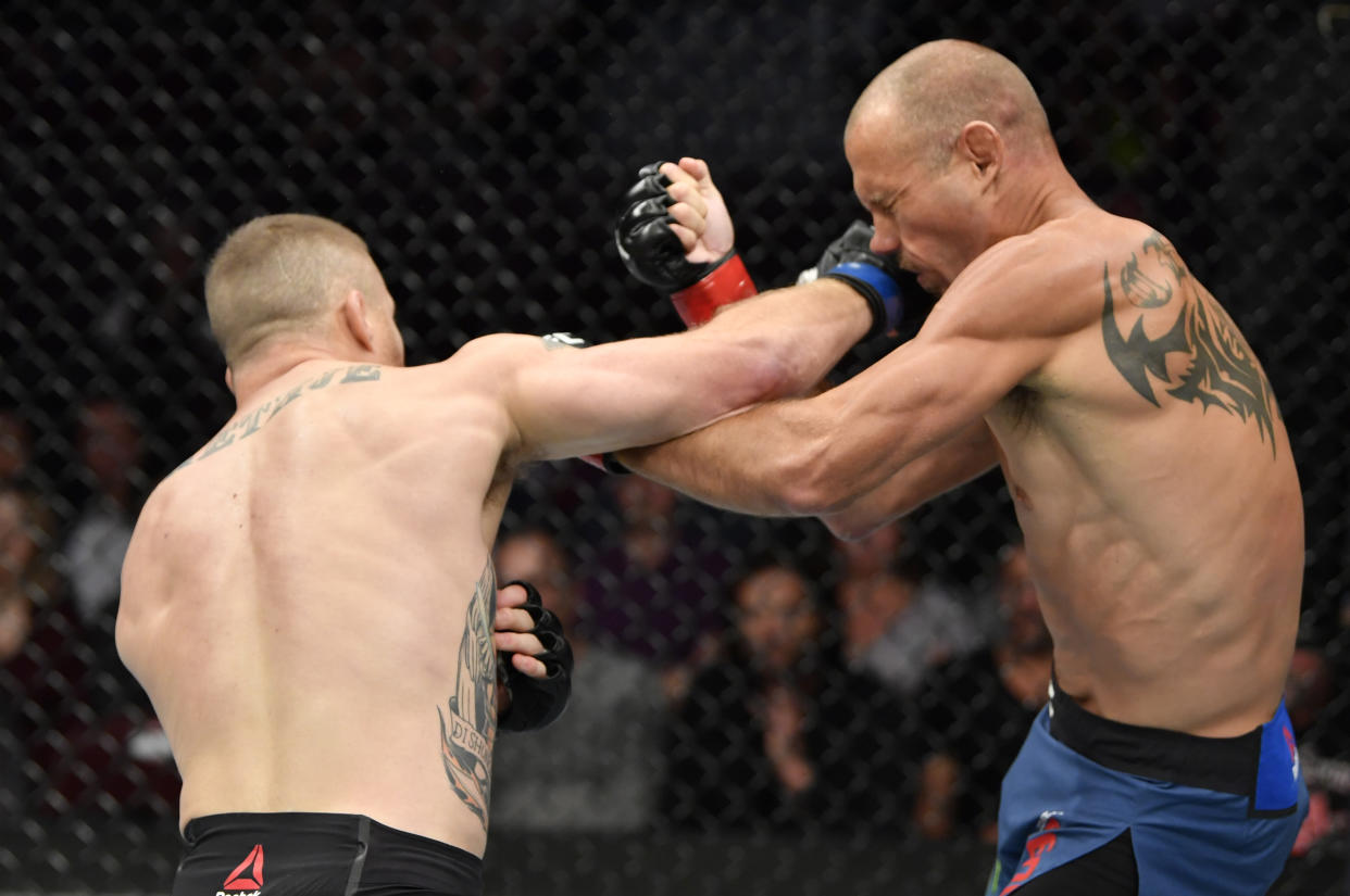 VANCOUVER, BRITISH COLUMBIA - SEPTEMBER 14:  (L-R) Justin Gaethje punches Donald Cerrone in their lightweight bout during the UFC Fight Night event at Rogers Arena on September 14, 2019 in Vancouver, Canada. (Photo by Jeff Bottari/Zuffa LLC/Zuffa LLC)