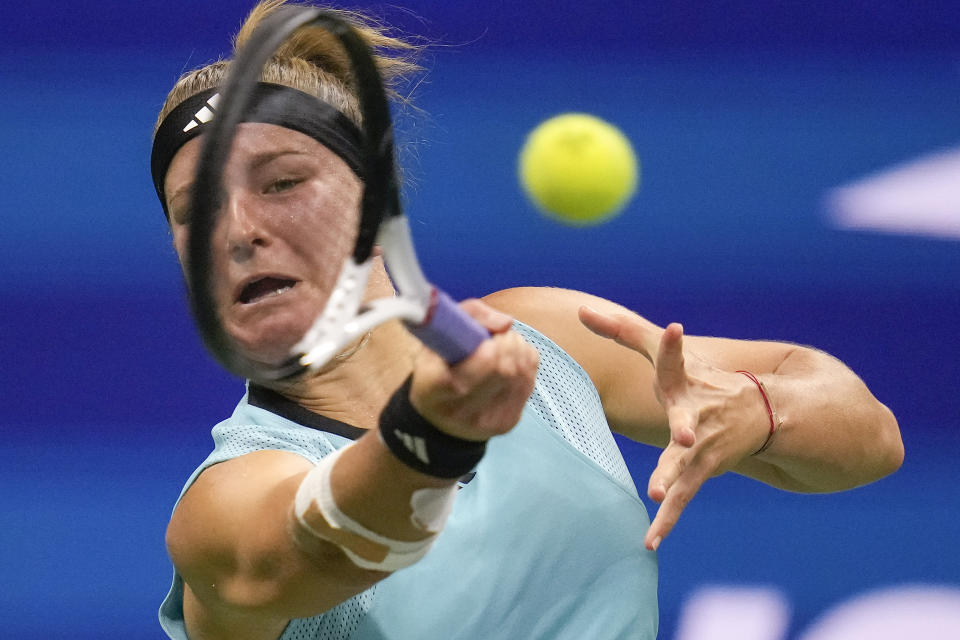 Karolina Muchova, of the Czech Republic, returns a shot to Sorana Cirstea, of Romania, during the quarterfinals of the U.S. Open tennis championships, Tuesday, Sept. 5, 2023, in New York. (AP Photo/Charles Krupa)