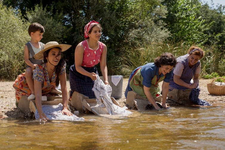<span class="caption">Almodóvar recreates an early childhood memory, in which his mother, played by Cruz, washes sheets in the river.</span> <span class="attribution"><span class="source">Pathé UK</span></span>