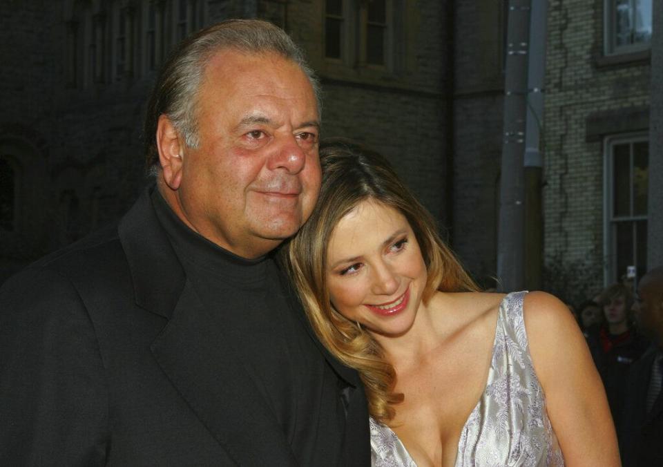 FILE - Mira Sorvino, right and father Paul Sorvino attend the premiere of 