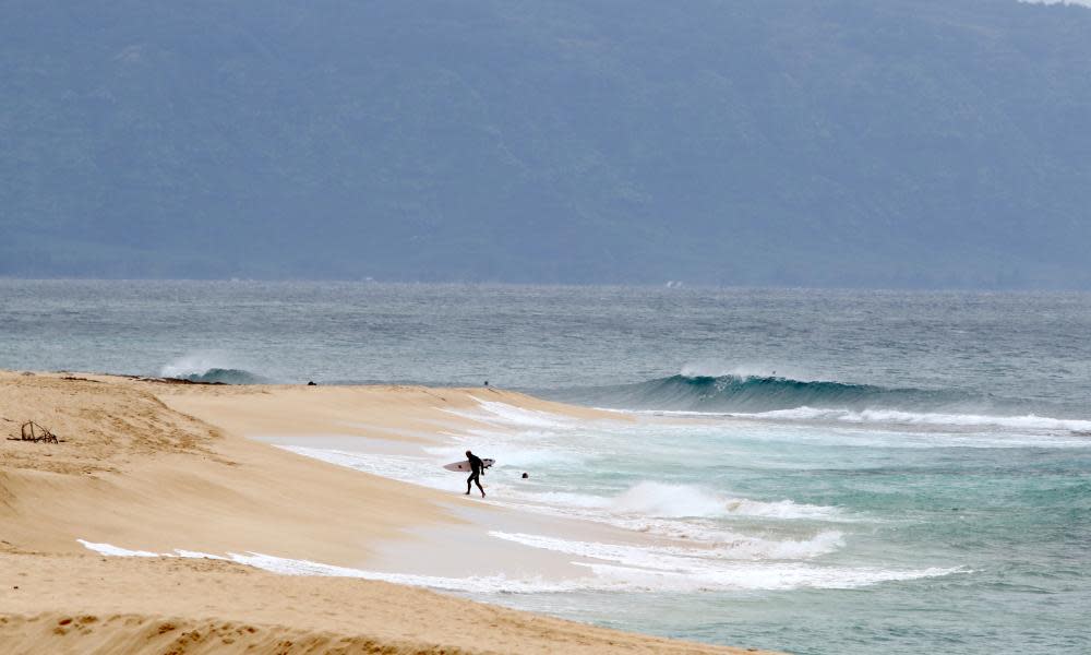 <span>Photograph: Caleb Jones/AP</span>