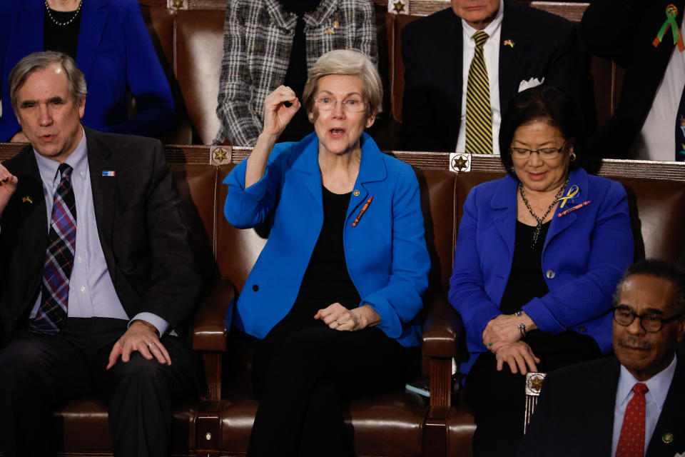 Senators Elizabeth Warren (D-Mass), left and Mazie Hirono (D-Hawaii) wear crayon pins during the 2023 State of the Union address. / Credit: Getty Images