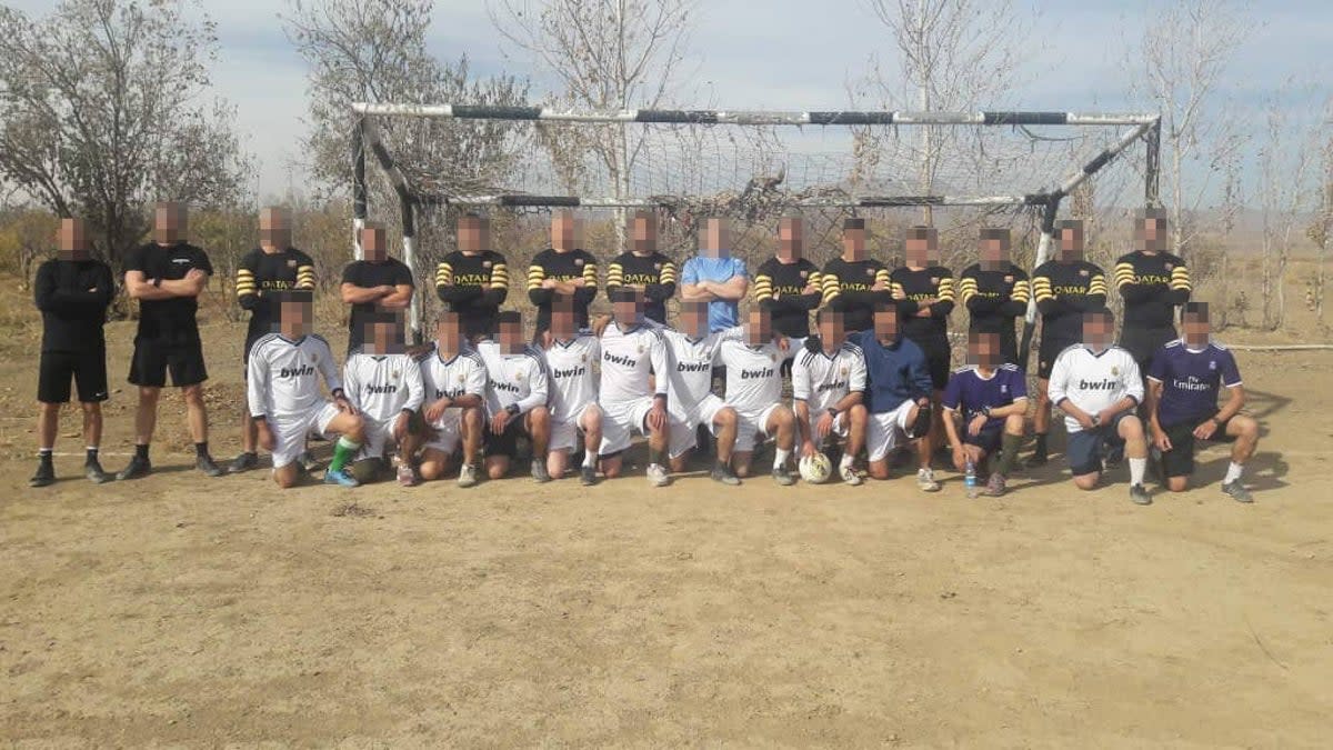 British and Afghan soldiers played football together at their joint army base (Supplied)