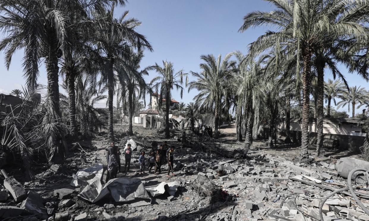 <span>Palestinians inspect destroyed buildings after an Israeli attack. More than 31,000 people in Gaza have been killed in the conflict so far.</span><span>Photograph: APAImages/Rex/Shutterstock</span>