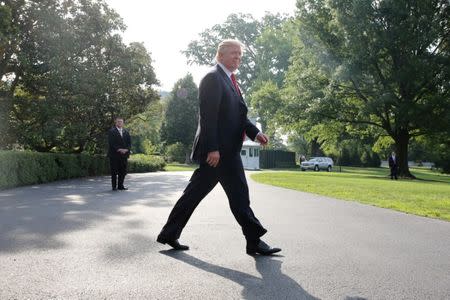 President Donald Trump leaves the White House before boarding Marine One in Washington, D.C., U.S. July 22, 2017. REUTERS/Zach Gibson