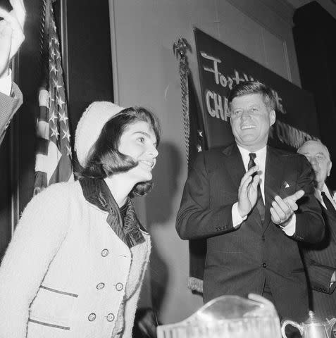 <p>Getty</p> President John F. Kennedy and his wife, First Lady Jackie Kennedy, on November 22, 1963, before the president was assassinated.