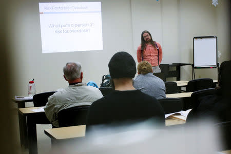 Thomas Womelsdorf, a Prevention Care Manager with the Southern Tier AIDS Program, addresses attendees during a free Opioid Overdose Prevention Training class provided by Lourdes Hospital in Binghamton, New York, U.S., April 5, 2018. REUTERS/Andrew Kelly