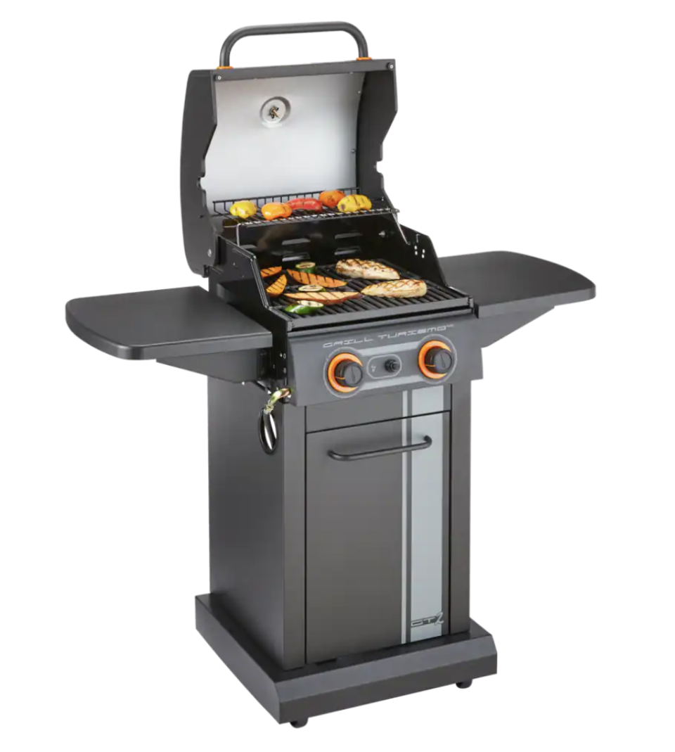 Master Chef Grill Turismo 2-Burner BBQ with vegetables and meat on grill (Photo via Canadian Tire)