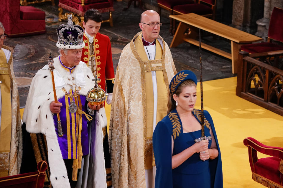 LONDON, ENGLAND - MAY 06: Lord President of the Council, Penny Mordaunt, holding the Sword of State walking ahead of King Charles III during the Coronation of King Charles III and Queen Camilla on May 6, 2023 in London, England. The Coronation of Charles III and his wife, Camilla, as King and Queen of the United Kingdom of Great Britain and Northern Ireland, and the other Commonwealth realms takes place at Westminster Abbey today. Charles acceded to the throne on 8 September 2022, upon the death of his mother, Elizabeth II. (Photo by Yui Mok - WPA Pool/Getty Images)