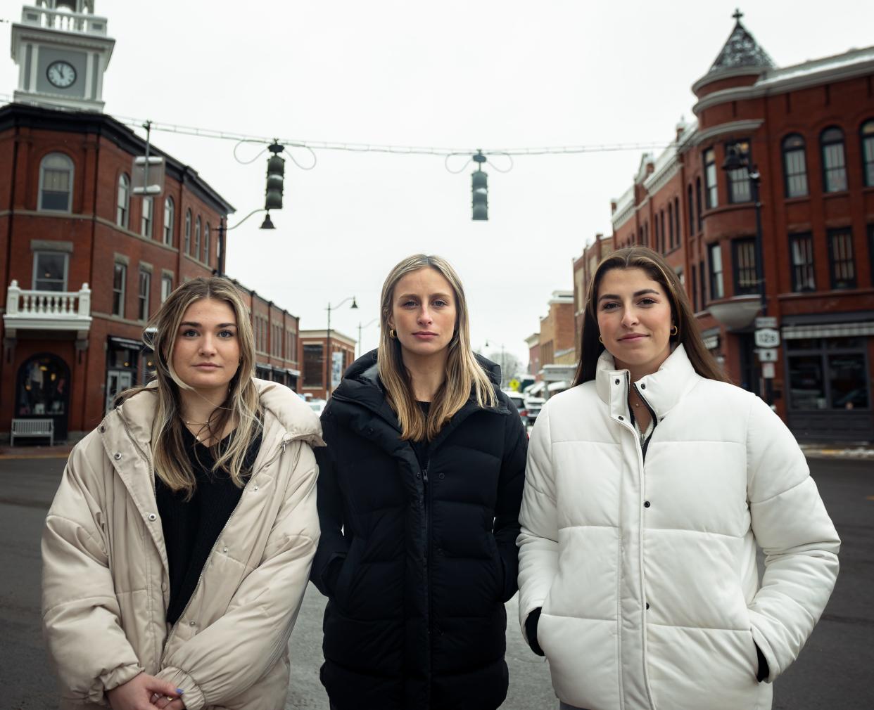 From left: Gracie Bowers, Eliza Soutter and Lauren Marandatt stand at the corner of Broad Street and Madison Street in Hamilton, NY on Tuesday, January 24, 2023.