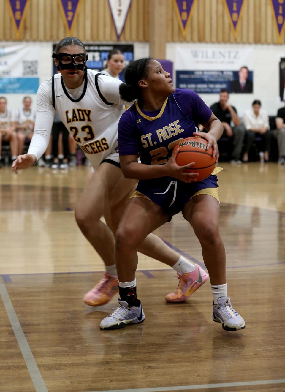 With St. John Vianney's Stella Lockhart (left) guarding her, St. Rose's Tanaiyah Decker looks for the basket during their game in Belmar Wednesday evening, January 31, 2024.