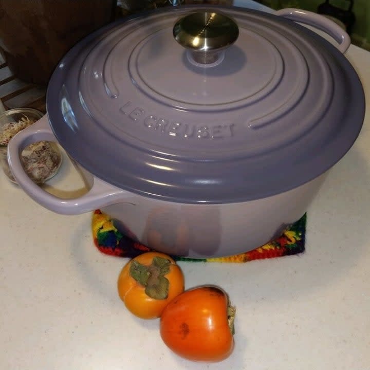 A reviewer's photo of the purple dutch oven